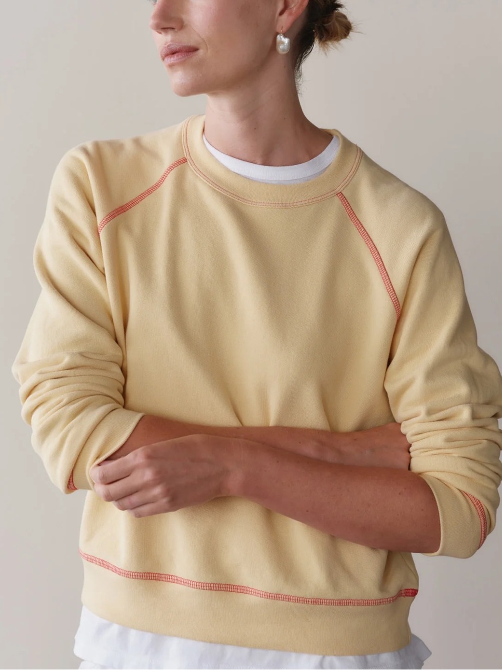 DONNI. The Eco-Terry Contrast Stitch Sweatshirt in Butter